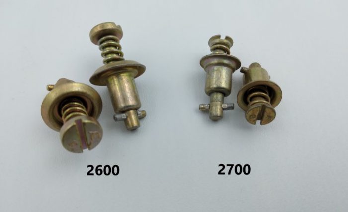 Two sets of Camloc fasteners labeled 2600 and 2700 are displayed side by side on a plain background. Each set includes two fasteners with visible springs and slotted heads.