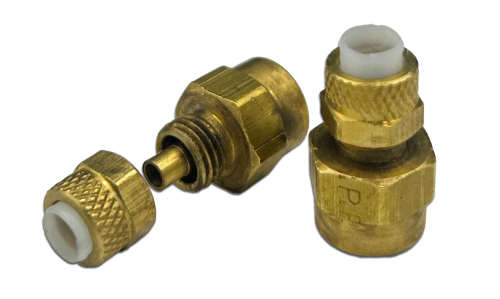 Two brass female connectors with knurled grips and white inner linings, shown side by side. One connector is assembled, while the other is partially disassembled to display its components.
