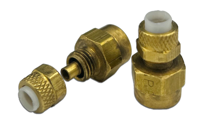 Two brass female connectors with knurled grips and white inner linings, shown side by side. One connector is assembled, while the other is partially disassembled to display its components.