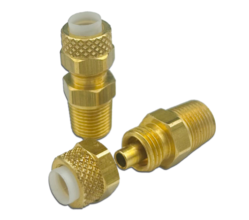 Three brass male connectors are shown, featuring threaded ends and a white inner ring. They are arranged with two standing upright and one lying down, highlighting their cylindrical shape and metallic finish.