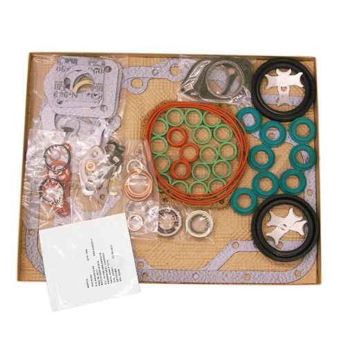 A flat lay image of a mechanical gasket kit, featuring various gaskets, seals, and O-rings in different colors and sizes. The items are arranged on a cardboard base with a list of contents visible in the corner.