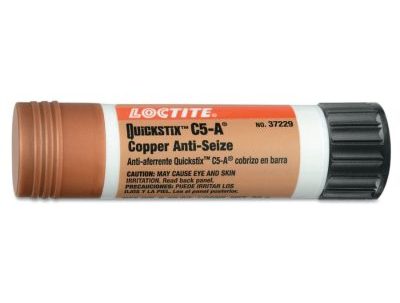 A tube of Loctite Quickstix C5-A Copper Anti-Seize is shown. The tube is copper-colored with a black cap, featuring cautionary text about potential skin and eye irritation.