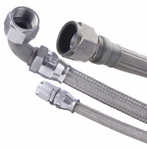Close-up image of a medium pressure hose with metal braided exterior and various fittings, including a bent connector. The hose is designed for durability and flexibility in medium pressure applications.