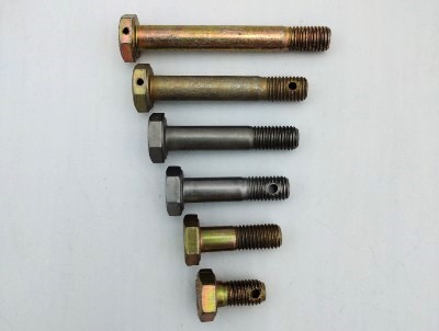 Image of six metal bolts of varying lengths arranged vertically on a light background. The bolts have hexagonal heads and threaded ends. The product is titled "Bolt AN4 – 1/4" (28)".