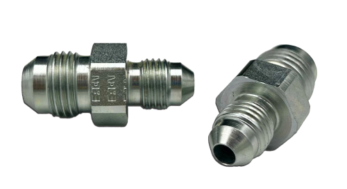 The image shows two small hex union fittings made of metal. One fitting is positioned upright, displaying its hexagonal center and threaded ends, while the other lies horizontally, highlighting its smooth, polished surface.