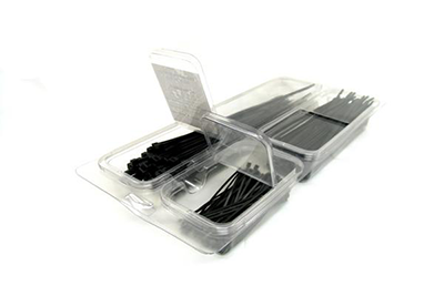 A clear plastic container holds a cable tie assortment, featuring various sizes of black cable ties neatly organized in separate compartments, with a transparent lid partially open.