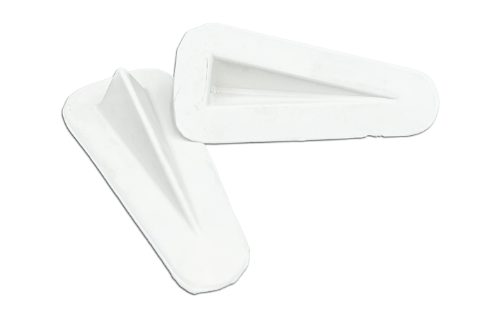 Two white, triangular control cable fairings with smooth surfaces and beveled edges are displayed. They are positioned at different angles, highlighting their aerodynamic design.