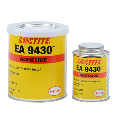 Two containers of Loctite EA 9430 Adhesive, labeled as Hysol Glue Adhesive, with yellow and red labels. The larger container is on the left, and the smaller one on the right, both featuring the Henkel logo.
