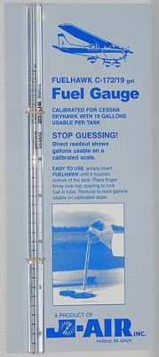 Fuelhawk Fuel Gauge, designed for Cessna aircraft, features a clear, calibrated scale for measuring fuel in gallons. The gauge emphasizes accuracy with a message stating "STOP GUESSING!" and includes an image of an airplane above the text.