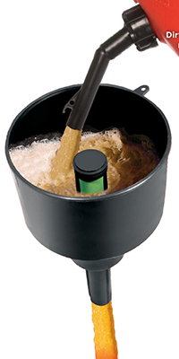 A fuel funnel is shown with a gas nozzle pouring fuel into it. The funnel has a wide opening and a narrow spout for easy pouring. The liquid appears to be brown, indicating fuel, and there are bubbles visible in the funnel.