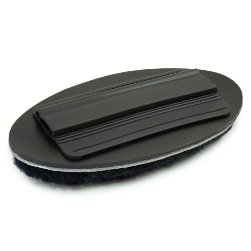 Oval-shaped Deluxe Headband Cushion with a black, textured surface and a smooth, elevated grip on top. The underside features a soft, plush material for comfort.