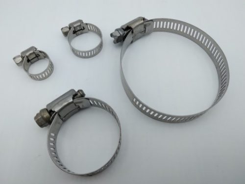 Four stainless steel clamps for motorsports are displayed on a white background. The clamps vary in size, with two larger and two smaller ones, featuring adjustable screw mechanisms for secure fastening.