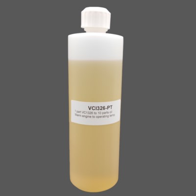 A bottle of engine preservative oil labeled "VCI326-PT" against a gray background. The bottle is cylindrical with a white cap and contains a light amber liquid.