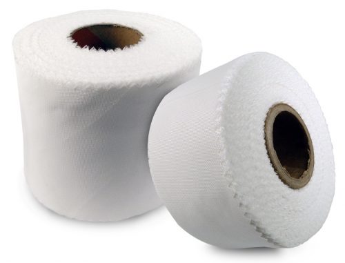 Two rolls of white bias pinked tape, one standing upright and the other lying on its side, showing the textured edges.