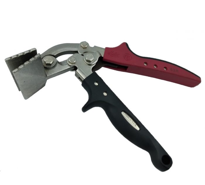 Offset hand seamer with red and black ergonomic handles, featuring a metal clamping jaw designed for bending and flattening sheet metal.