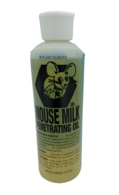 A bottle of Mouse Milk Penetrating Oil with a white cap and a label featuring a cartoon mouse. The label includes the product name and usage instructions. The bottle is 8 fluid ounces.