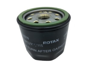 A Rotax oil filter with a green gasket and multiple holes on top. The words "ROTAX" and "TURN AFTER GASKET" are printed on the black surface.