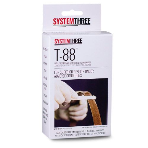 Box of System Three T-88 Epoxy, featuring an image of someone applying the adhesive to a wooden surface. The packaging highlights its high-performance and suitability for use under adverse conditions.