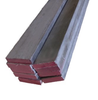 Stack of rectangular 2024-T3 aluminum bar stock with red-painted ends, arranged horizontally against a white background.