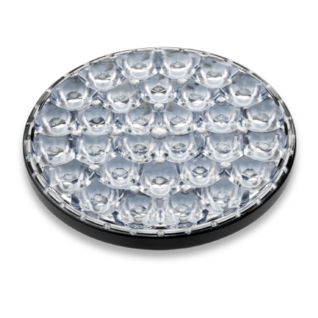 A round, clear LED light lens with multiple small, convex lenses arranged in a grid pattern on a black background.