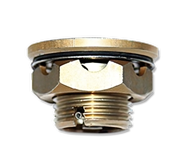 Drain valve CCB 36450 shown from the side, featuring a brass body with a threaded end and a circular top. The valve has a rubber O-ring for sealing and a small lever for operation, designed for fluid control in plumbing systems.