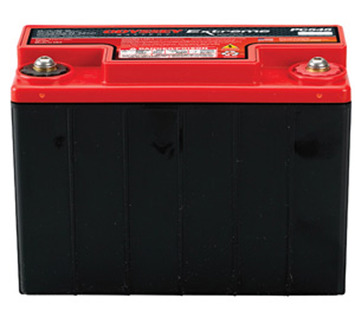 A black Odyssey Battery with a red top, featuring two metal terminals on either side for connections. The brand name and specifications are visible on the top surface.