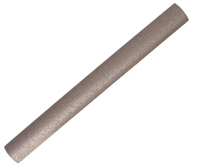 Image of a Perma-Grit External Grit File, featuring a cylindrical shape with a textured, abrasive surface designed for filing and shaping materials. The file is positioned diagonally against a plain white background.