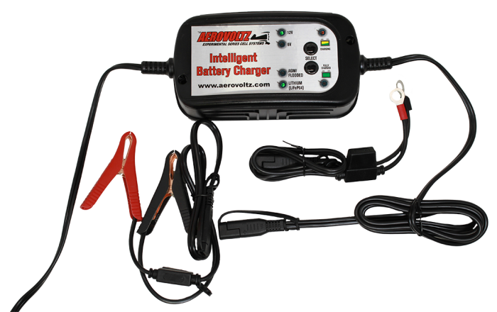 AEROVOLTZ AI Series Battery Charger with intelligent charging technology, featuring indicator lights and attached cables with clamps and ring terminals for versatile battery connection.