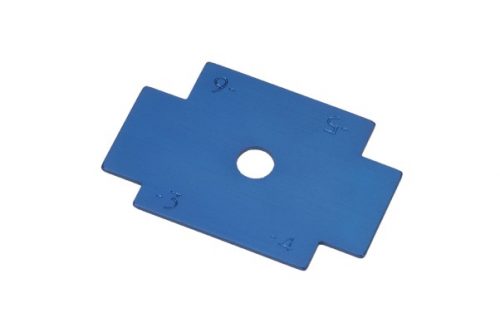 Blue rectangular metal piece with a central hole, part of an Economy Rivet Tool Set. The piece has numbered corners and is designed for aligning or measuring in rivet applications.