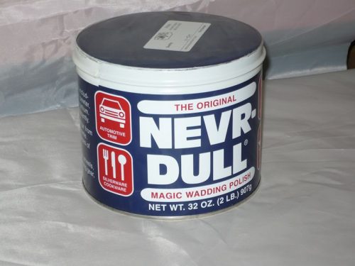 A 32-ounce container of Nevr-Dull Magic Wadding Polish with a blue label, featuring icons for automotive and household use. The container is placed on a white surface.