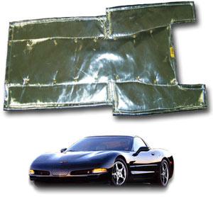 A shiny, rectangular car insulation mat is displayed above a sleek black sports car. The mat appears to be designed for automotive use, possibly for heat or sound insulation. The car is parked on a white background.