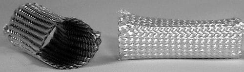 Two metallic cylindrical stents are displayed on a neutral background. The stent on the left is shown from an angle, highlighting its hollow interior, while the stent on the right is positioned horizontally, showcasing its woven texture.
