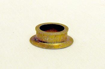 A small, round, brass bushing with a flared base is placed on a plain white background.