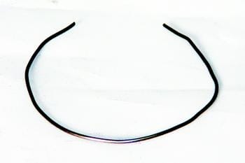 A thin, black wire bent into a loose, irregular circular shape on a white background.