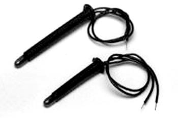 Two black ignition coils with attached wires, placed parallel to each other on a white background.