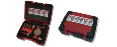 Red and black plastic case with a label, shown open and closed. The open case reveals organized tools, including a brush and cylindrical items, set in foam padding.