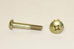 A metal screw and a matching bolt are placed on a plain surface. The screw has a flat head with a Phillips drive, while the bolt is cylindrical with threading along its shaft.
