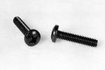 Two black screws on a white surface, one lying flat and the other standing upright, both with Phillips heads.