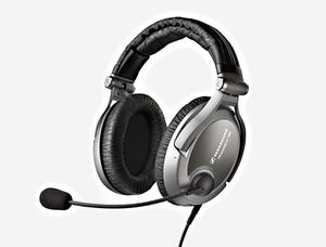 Black and silver over-ear headphones with a cushioned headband and attached microphone on a flexible arm.