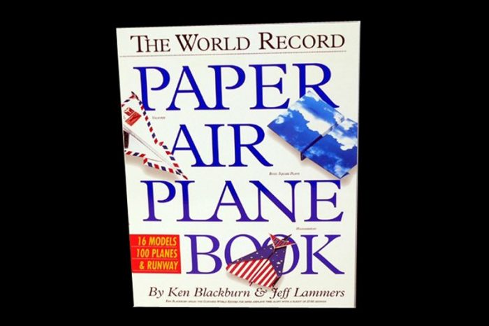 Cover of "The World Record Paper Airplane Book" by Ken Blackburn and Jeff Lammers, featuring images of paper airplanes and text highlighting "16 models, 100 planes, 4 runway."