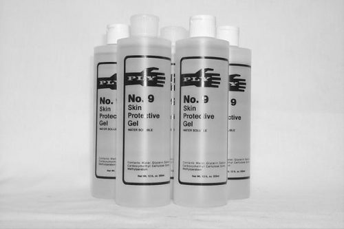 Five bottles of No. 9 Skin Protective Gel are arranged in a cluster. The bottles are clear with white caps and feature a label with black text and graphics. The image is in black and white.