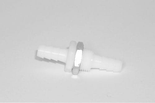 White plastic hose connector with barbed ends and a hex nut in the center, placed on a plain gray background.