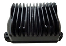A black, rectangular heat sink with vertical fins, designed to dissipate heat from electronic components.