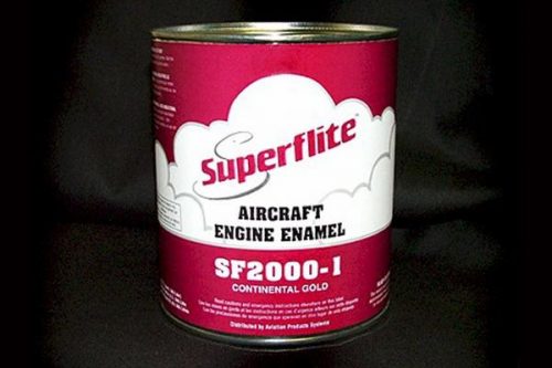 A can of Superflite Aircraft Engine Enamel, SF2000-I Continental Gold, with a red and white label featuring cloud graphics, against a black background.
