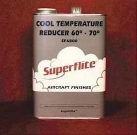 A metal container labeled "Superflite Cool Temperature Reducer 60°-70° SF6800" for aircraft finishes, featuring a cloud design on a red background.